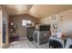 Functional dog kennels with gray floor and shelving providing storage and organization at 16643 W Quail Run Rd, Surprise, AZ 85378