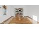 Bright kitchen area featuring light cabinetry and wood floors at 16643 W Quail Run Rd, Surprise, AZ 85378