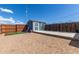 Exterior view of the outbuilding, with dog kennels at 16643 W Quail Run Rd, Surprise, AZ 85378