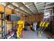 View of the outbuilding interior, featuring shelving and ample storage space at 16643 W Quail Run Rd, Surprise, AZ 85378