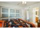 Bright bedroom with a sliding door closet and connecting bathroom at 16729 N 157Th Ave, Surprise, AZ 85374