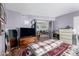 Cozy bedroom features wood flooring and an open doorway leading to the living area at 16739 E El Lago Blvd # 202, Fountain Hills, AZ 85268