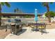 Outdoor grilling area with a BBQ and seating, perfect for outdoor entertaining and enjoying the sunshine at 16739 E El Lago Blvd # 202, Fountain Hills, AZ 85268