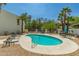 This property features a private outdoor pool with desert landscaping and ample seating at 16739 E El Lago Blvd # 202, Fountain Hills, AZ 85268