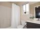 Bathroom with a single sink vanity, toilet, and shower at 17606 N 17Th Pl # 1115, Phoenix, AZ 85022