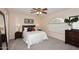 Bedroom features carpet flooring, a window, and neutral paint at 17606 N 17Th Pl # 1115, Phoenix, AZ 85022