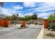 Gated community entrance offers security and privacy, complemented by well-maintained landscaping at 17606 N 17Th Pl # 1115, Phoenix, AZ 85022