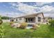 Beautiful backyard with a pool and landscaping, ideal for relaxation and outdoor entertainment at 17790 N 66Th Ln, Glendale, AZ 85308