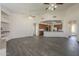 Open layout with tile flooring throughout, connecting the living area to the kitchen at 17790 N 66Th Ln, Glendale, AZ 85308