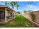 Expansive backyard featuring a well-maintained lawn, perfect for outdoor activities and entertaining at 18725 N 92Nd Dr, Peoria, AZ 85382