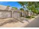 Attractive homes featuring two-car garages and well-kept lawns, enhancing curb appeal at 18725 N 92Nd Dr, Peoria, AZ 85382