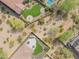 Aerial view of backyard featuring landscaped yard, an outdoor kitchen, and desert views at 1904 N Steele --, Mesa, AZ 85207
