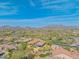 Stunning aerial view of home with desert landscape and mountain views, highlighted with property lines at 1904 N Steele --, Mesa, AZ 85207