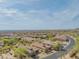 Aerial shot of the property showcasing the desert landscape, defined property lines, and neighboring houses at 1904 N Steele --, Mesa, AZ 85207