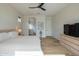 Comfortable bedroom showcasing wood-look floors and modern design with an open hallway at 1904 N Steele --, Mesa, AZ 85207