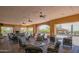 Outdoor patio with fireplace, seating, tables, desert views, and shade from the Arizona sun at 1904 N Steele --, Mesa, AZ 85207