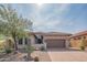 Charming single-story home featuring desert landscaping, a brick driveway, and a tile roof at 1904 N Steele --, Mesa, AZ 85207