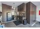 Organized garage features plentiful dark cabinets, workbench, and well-lit storage for tools and accessories at 1904 N Steele --, Mesa, AZ 85207
