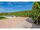Spacious backyard featuring a pool, a fire pit, and ample space for outdoor living and entertaining at 21617 S 229Th Way, Queen Creek, AZ 85142