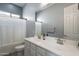 Bathroom featuring double vanity, soaking tub, and ample lighting at 21617 S 229Th Way, Queen Creek, AZ 85142