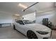 Spacious three car garage with ample room for parking and storage at 21617 S 229Th Way, Queen Creek, AZ 85142