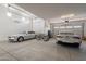 Spacious three car garage with ample room for parking and storage at 21617 S 229Th Way, Queen Creek, AZ 85142