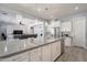 Spacious kitchen featuring a large island, stainless steel appliances, and seamlessly connects to living spaces at 21617 S 229Th Way, Queen Creek, AZ 85142