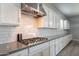 Well-equipped kitchen with stainless steel appliances, ample counter space, and modern finishes at 21617 S 229Th Way, Queen Creek, AZ 85142