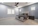 Elegant main bedroom showcasing plush carpet and stylish decor at 21617 S 229Th Way, Queen Creek, AZ 85142