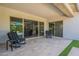Relax on the patio, easily accessible with large glass sliding doors, enhancing the seamless transition from indoor to outdoor living at 21617 S 229Th Way, Queen Creek, AZ 85142