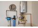 Tankless water heater and water filtration system provide efficiency and clean water throughout the home at 21617 S 229Th Way, Queen Creek, AZ 85142