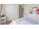 Serene bedroom featuring white furniture, a nautical theme, and natural light at 22300 N Kingston Dr, Maricopa, AZ 85138