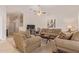 Cozy living room featuring comfortable furniture, and neutral decor at 22300 N Kingston Dr, Maricopa, AZ 85138