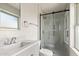 Modern bathroom with new vanity and upgraded shower stall at 2331 W Hartford Ave, Phoenix, AZ 85023