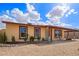 Charming single-story home with desert landscaping and a covered front porch at 2331 W Hartford Ave, Phoenix, AZ 85023