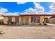 Charming single-story home with desert landscaping and a covered front porch at 2331 W Hartford Ave, Phoenix, AZ 85023