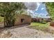Spacious backyard features a covered patio, barbeque area and desert landscaping at 23405 N 84Th St, Scottsdale, AZ 85255