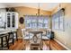 Cozy dining area with a round table, surrounded by natural light at 2400 E Baseline Ave # 94, Apache Junction, AZ 85119