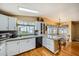 Bright, functional kitchen with ample counter space and a dining area nearby at 2400 E Baseline Ave # 94, Apache Junction, AZ 85119