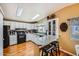 Bright kitchen featuring white cabinets, granite countertops, and modern appliances at 2400 E Baseline Ave # 94, Apache Junction, AZ 85119