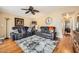 Inviting living room featuring hardwood floors, comfortable seating, and a ceiling fan at 2400 E Baseline Ave # 94, Apache Junction, AZ 85119