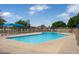 Inviting pool with seating and shaded area, perfect for relaxation and recreation on sunny days at 2434 W Eugie Ave, Phoenix, AZ 85029