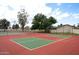 Well-maintained tennis and pickleball courts provide a great amenity for active residents in a lush setting at 2434 W Eugie Ave, Phoenix, AZ 85029