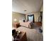 Cozy bedroom featuring neutral carpet, comfortable bed, and practical furniture at 2661 N Wright Way, Mesa, AZ 85215