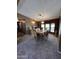 Inviting dining room with a wooden table, comfortable seating, and ample natural light at 2661 N Wright Way, Mesa, AZ 85215