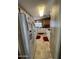 Well-equipped kitchen featuring modern appliances, white cabinetry, and neutral countertops at 2661 N Wright Way, Mesa, AZ 85215
