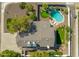 Expansive backyard featuring a pool, putting green, and outdoor seating area, perfect for entertaining at 2818 N Yucca St, Chandler, AZ 85224