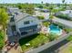 Backyard features a pool, a covered patio with an outdoor kitchen, and a manicured lawn, perfect for relaxing at 2818 N Yucca St, Chandler, AZ 85224