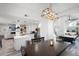 Open-concept kitchen and dining area with modern fixtures and ample natural light at 2818 N Yucca St, Chandler, AZ 85224