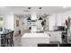 Bright, modern kitchen with stainless steel appliances and views of the living room at 2818 N Yucca St, Chandler, AZ 85224